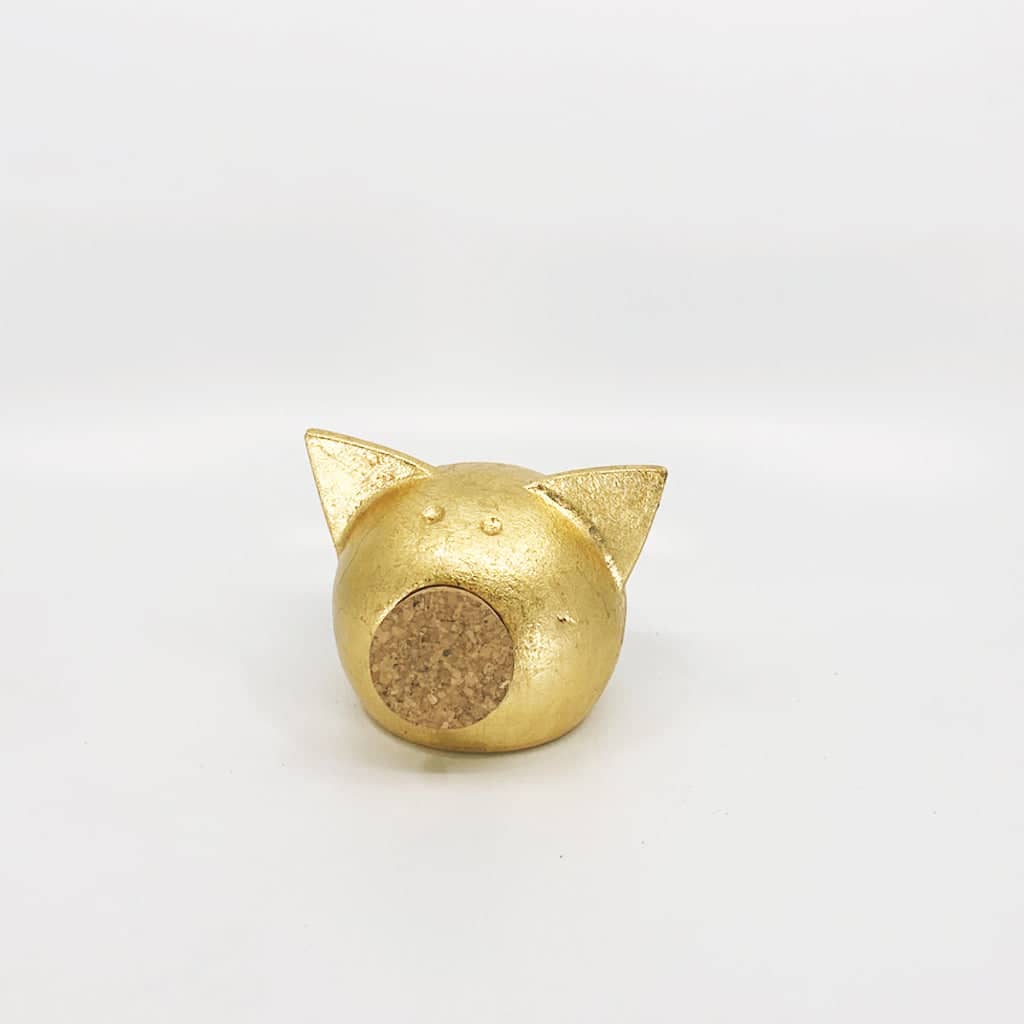 Golden piggy bank for decor & savings inspiration.